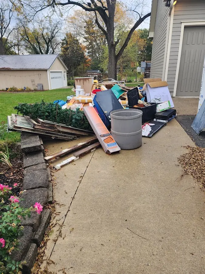 Dumpster being loaded with debris for Commercial Dumpster Rental in Damascus